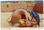 Carte Postale Moderne Etats-Unis - Taos Pueblo, femme Taos faisant son pain
