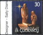 Guernesey 1999 -Sujet de crche en bois sculpt: la Sainte Fa - YT 845/SG 846 **