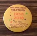 Badge pingl Organisateur 2018 Tlthon 60 ans de Conqutes & d'Innovation