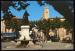 CPM  anime AIGUES MORTES Place Saint Louis la Statue du Roi et l'Eglise Notre Dame des Sablons