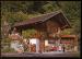 CPM  anime Suisse Vieille maison sur le plateau de Berne et groupe en costumes