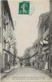 CPA St-BONNET LE CHATEAU. Rue Chevalier le 14 juillet 1910 (animée)